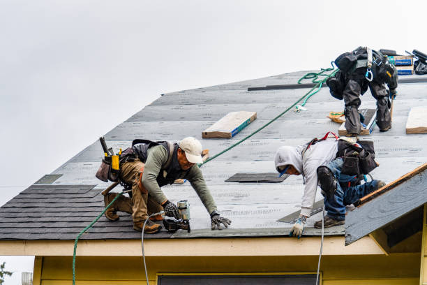 Professional Gutter Installation technician working in Elma, WA